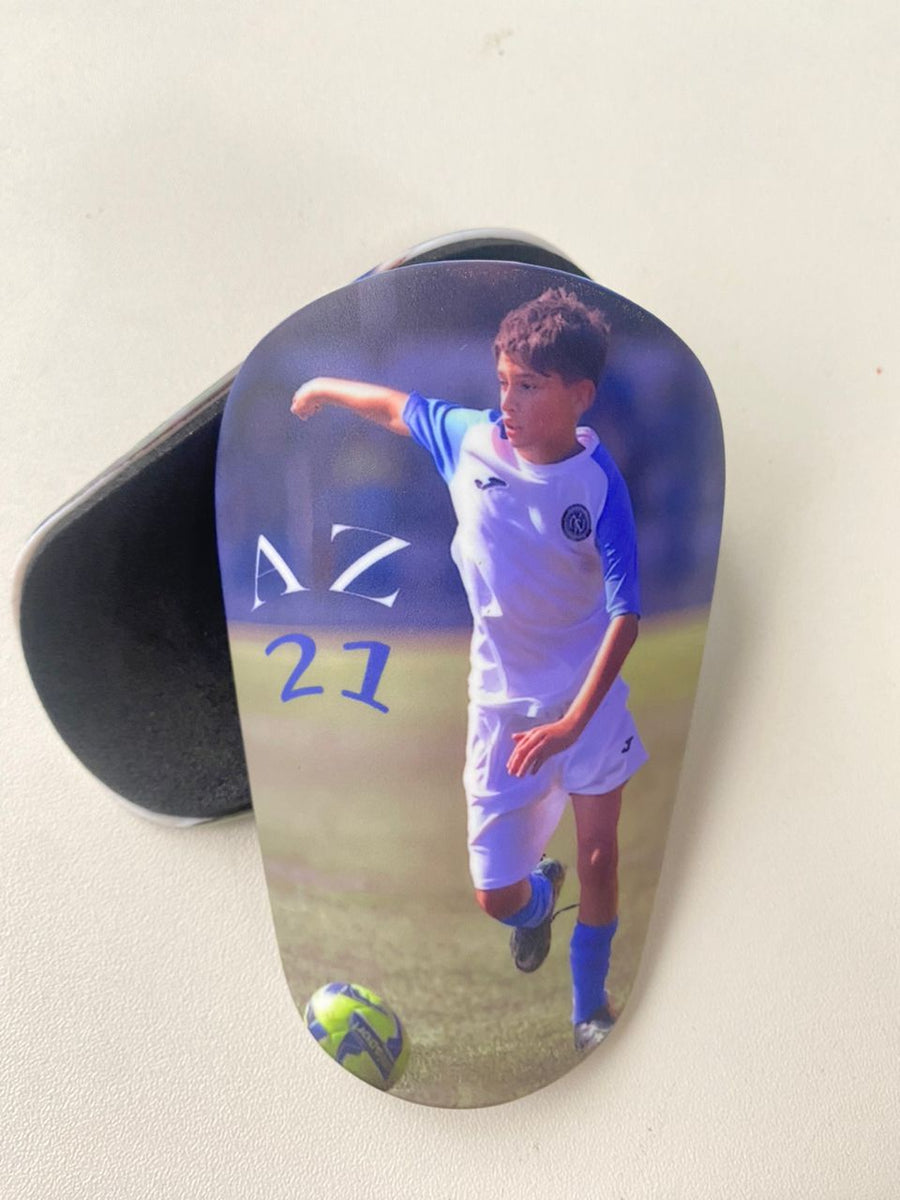 Custom shin guards with a young player photo and AZ 21