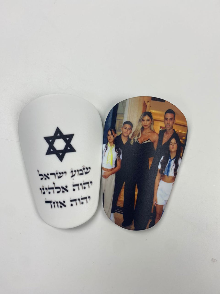 Custom shin guards with a family photo and Shema Israel