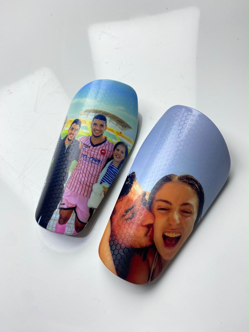 Custom shin guards with stadium group and couple photos